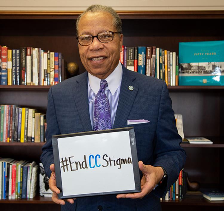 Tri-C President Alex Johnson shows his support for the #EndCCStigma social media campaign.