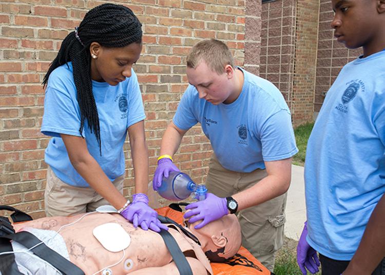 Public Safety Summer Academy students participate in a mock emergency scenario.