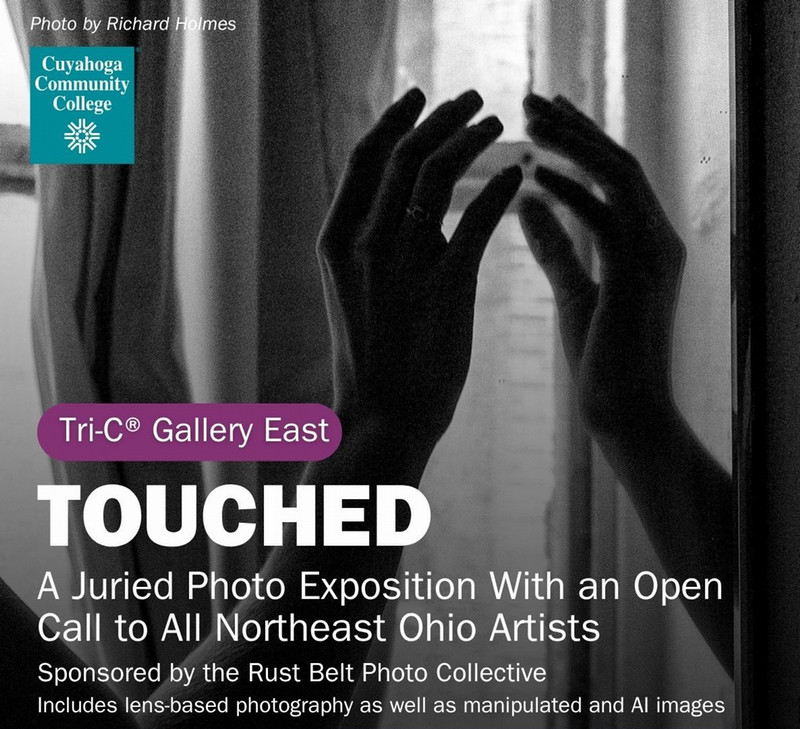 Black and white photo of a hand in a mirror by Richard Holmes