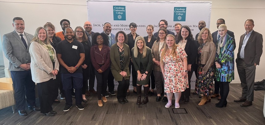 A group of people smiling