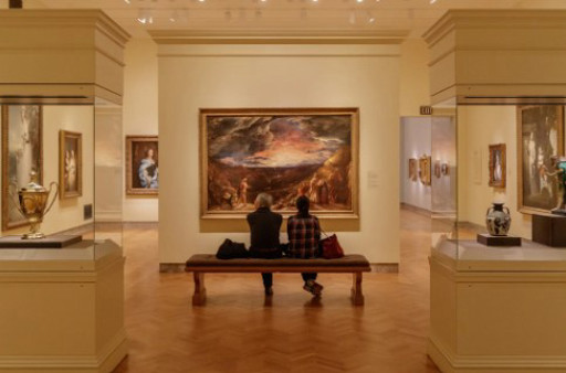 people looking at art