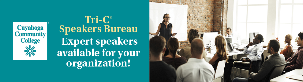 speakers bureau image with people facing a speaker