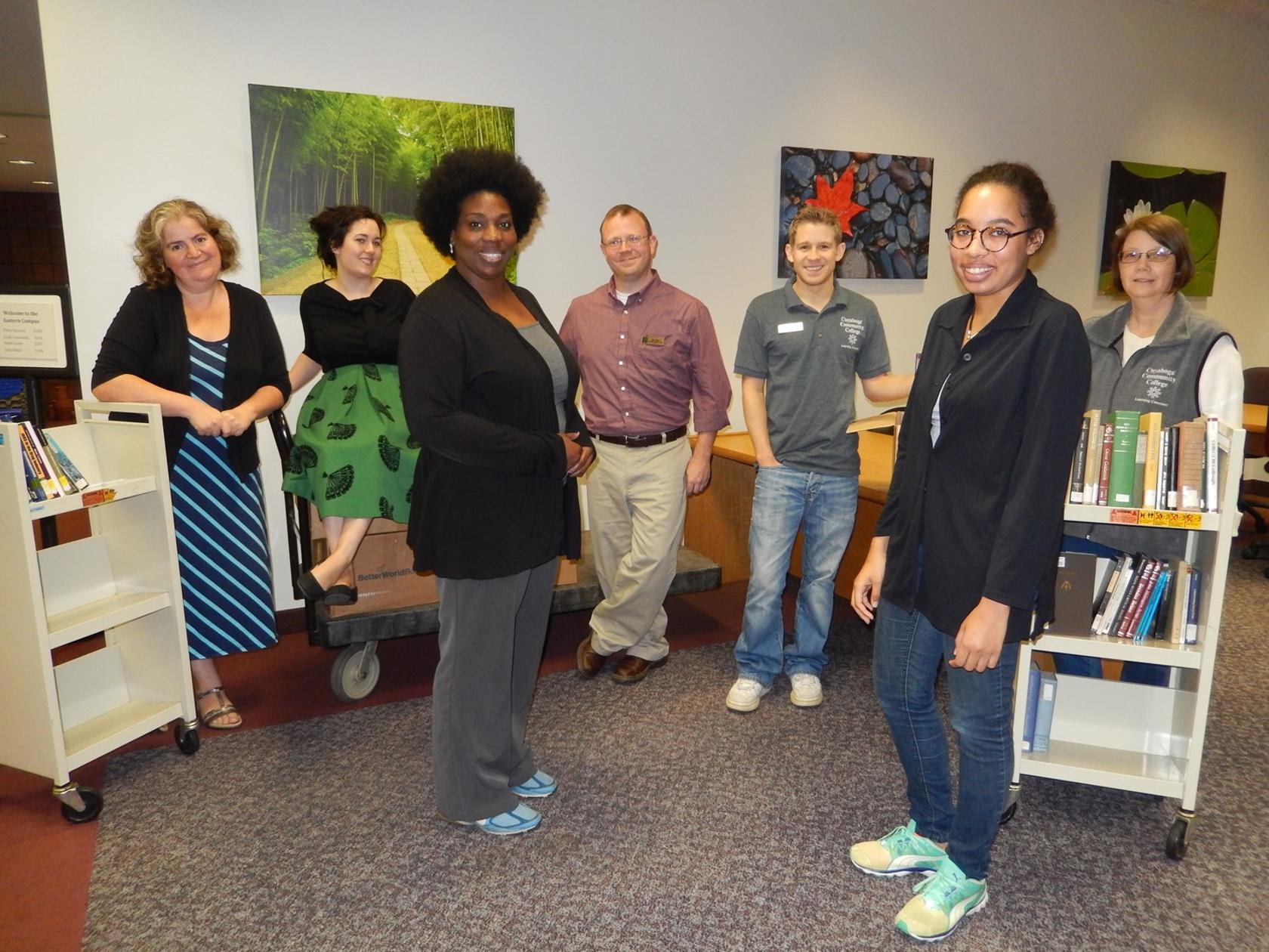 Eastern Campus Library staff with books being sent to Better World Books for reuse or recycling.