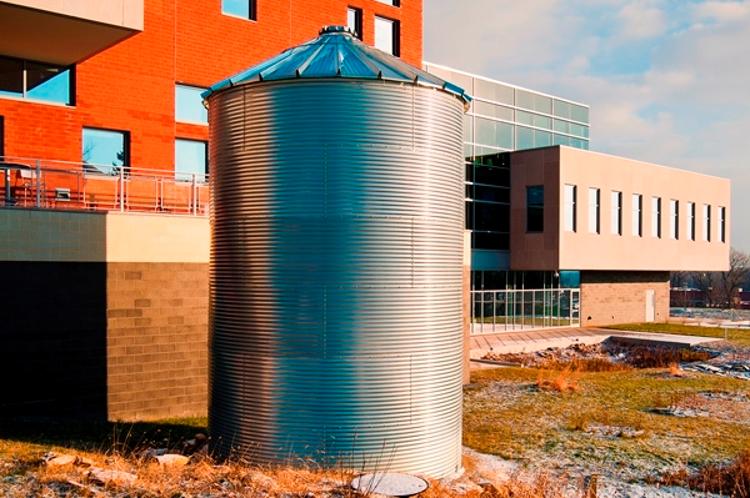 A 28,000 gallon cistern at the Eastern Campus Health Careers and Technology building captures runoff from the roof for later use for irrigation. Nearby landscaping includes bioswales to slow stormwater runoff, reduce erosion, and improve water quality.