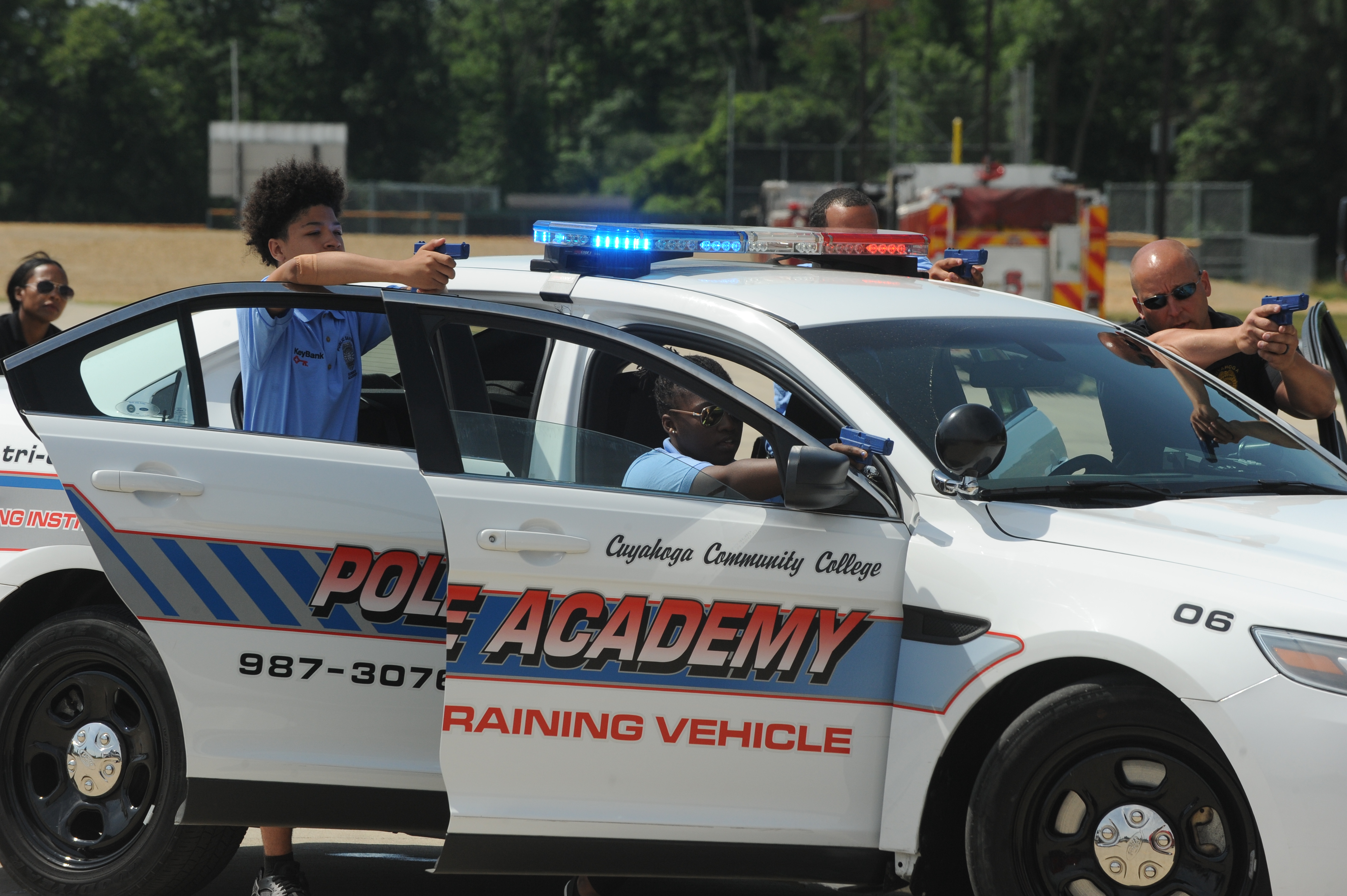 Students in police car