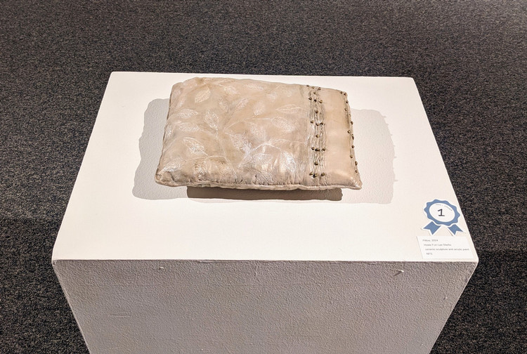 artwork on pedestal