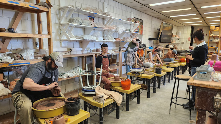 group of students in ceramic class