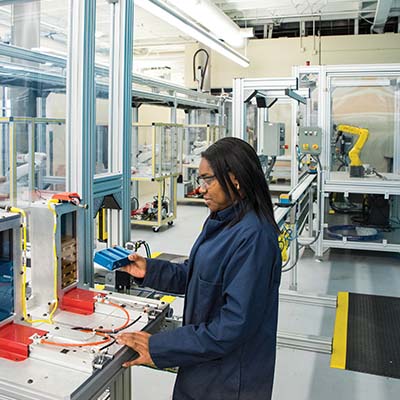 Woman working on machine