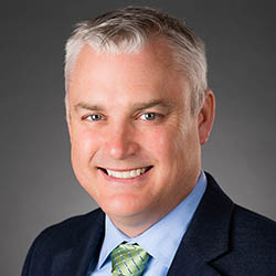 Dr. Andrew Cox, Executive Director, Access, and Community Engagement