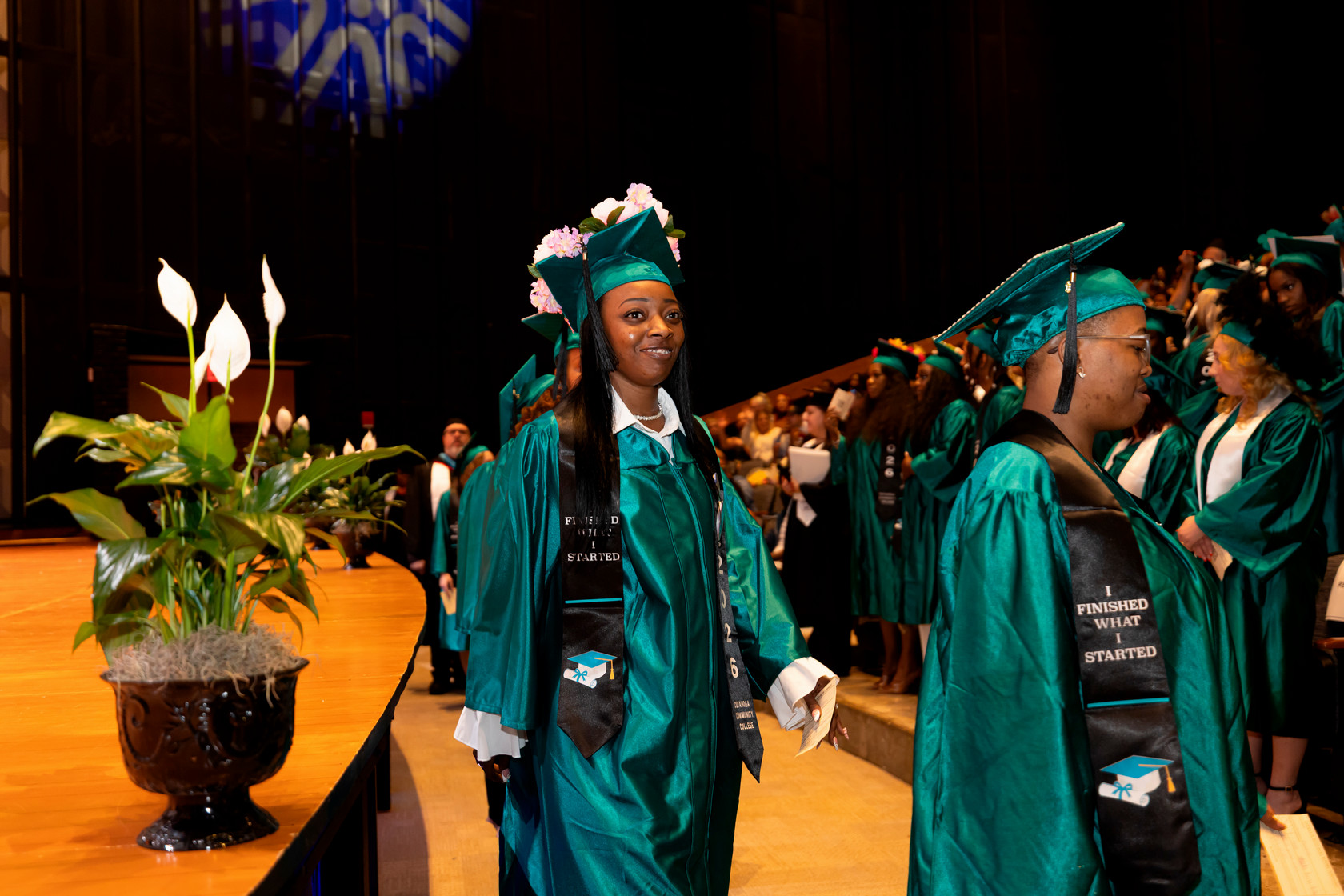 Students walking back to their seat for the ceremony
