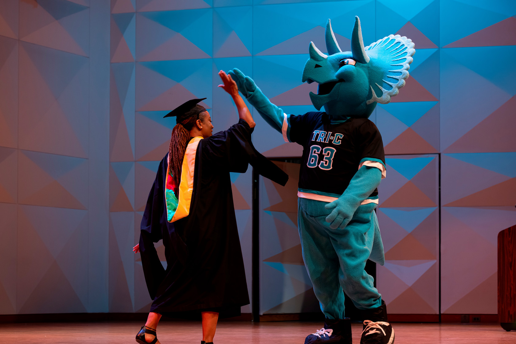 Stump and Executive director passing high fives