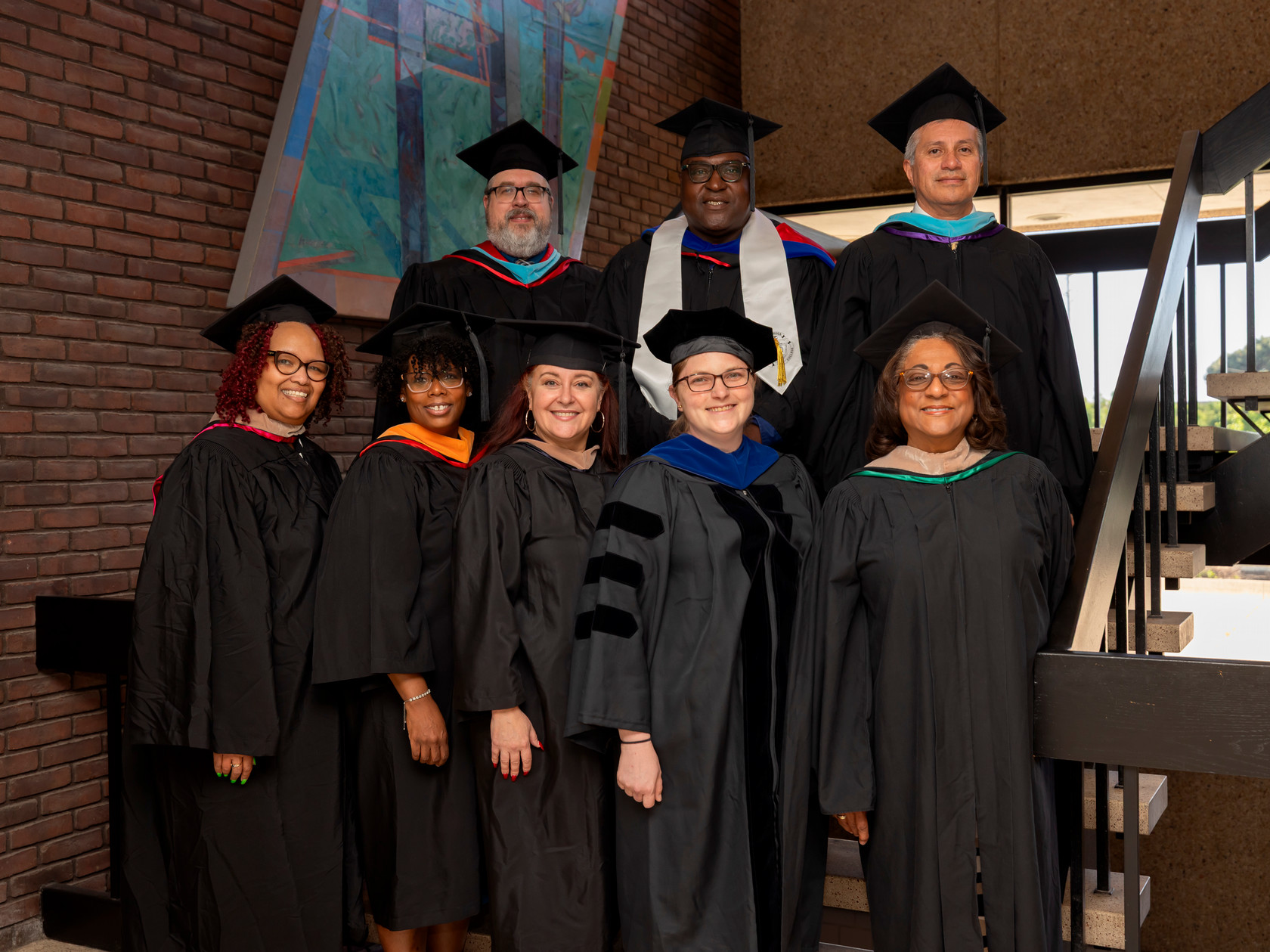 faculty on steps