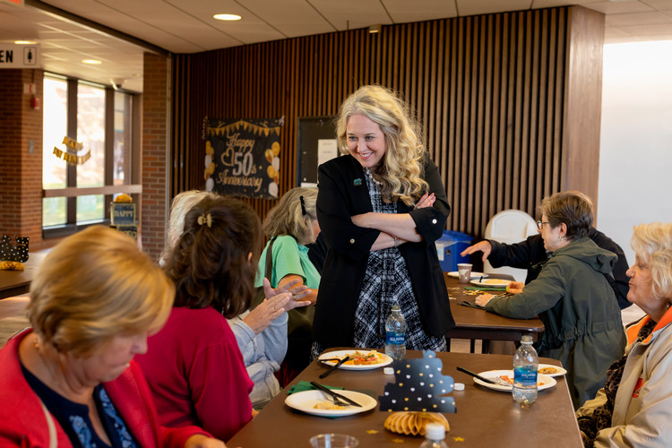 Photo of Dr. Rahschulte with Students
