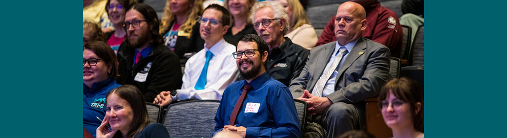 Faculty enjoying Convocation.