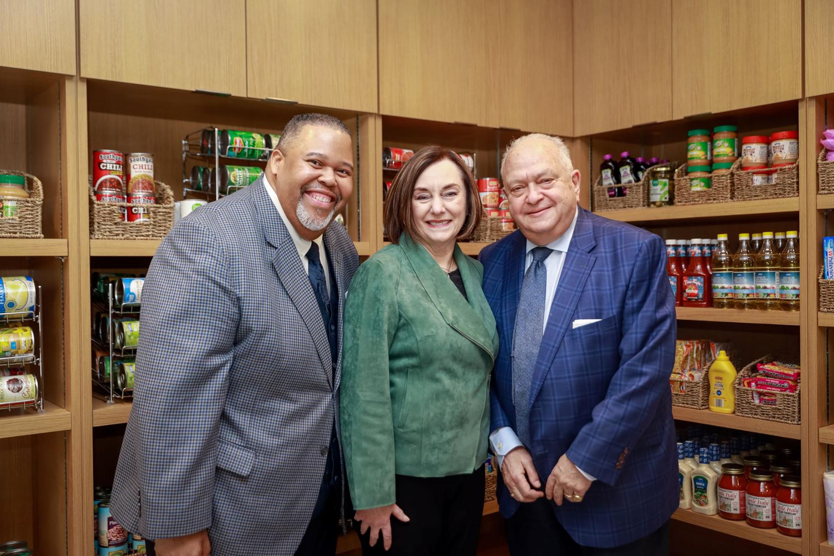 Tri-C President Michael Baston with Ann and Lou Frangos at Westshore Pantry