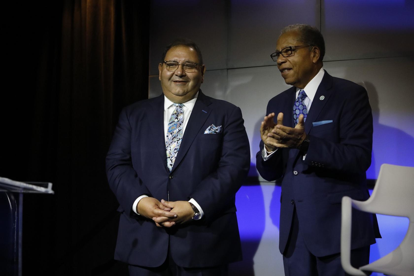 Dr. Akram Boutros, president and CEO of MetroHealth, and Tri-C President Alex Johnson announce a $1 million gift from the health system