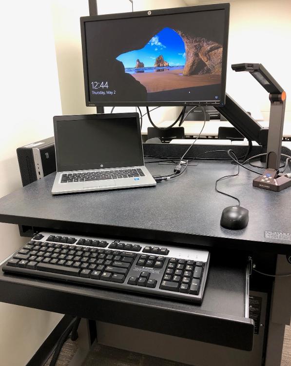 Lectern with desktop computer, laptop and document camera