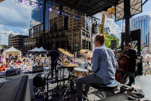 A photo of a band performing outdoors at Tri-C JazzFest