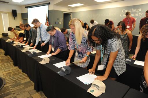 Students at Tri-C's 2018 Honors Program Fellowship signing ceremony