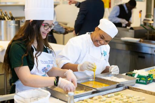 Students preparing good eats at the 2018 "Taste of the Tee" event at Tri-C.
