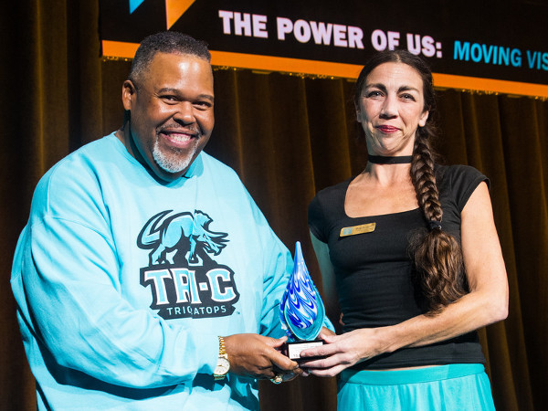 Photo of Michelle Davis, right, with Tri-C president Michael A. Baston