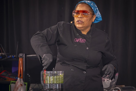 Peggy Cruz cooking at Jazzfest