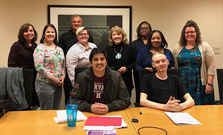 Anthony Ahmad (front left) and Kyle Ray (front right) with the cross-campus coalition.