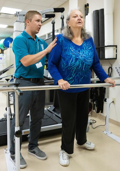 A Tri-C student working with a client at the Preventative Care Center