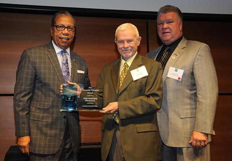 (Left to right) Tri-C President Alex Johnson, Terry Pfleiderer and The Illuminating Company President John Skory