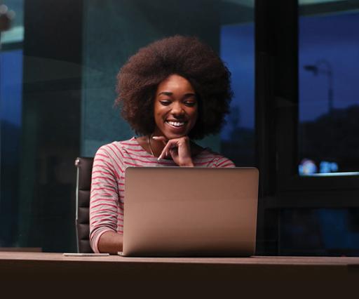 Black woman using laptop