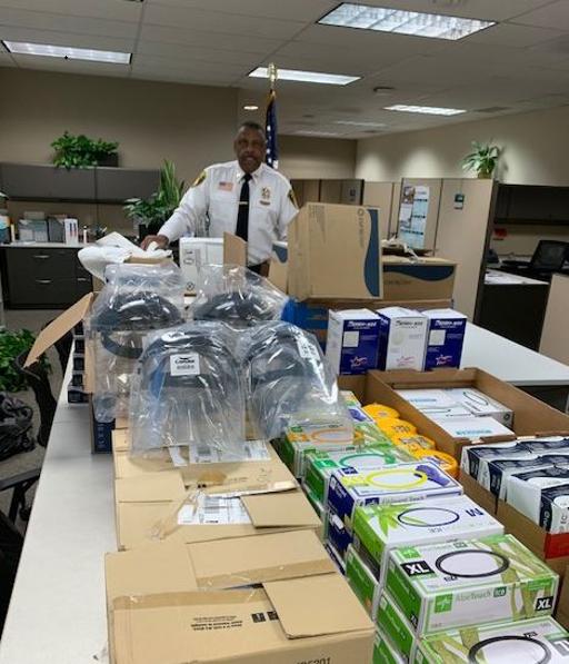 Tri-C Police Chief Clayton Harris with donated medical supplies.