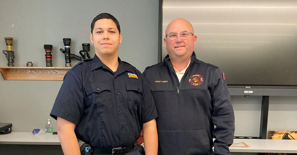 Photo of Dominic Miller and Parma Fire Chief Mike Lasky