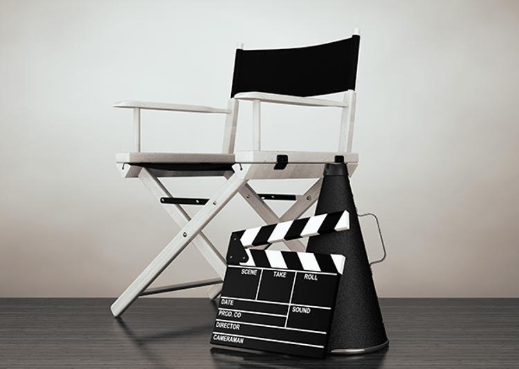 Director's chair, megaphone and movie clapper