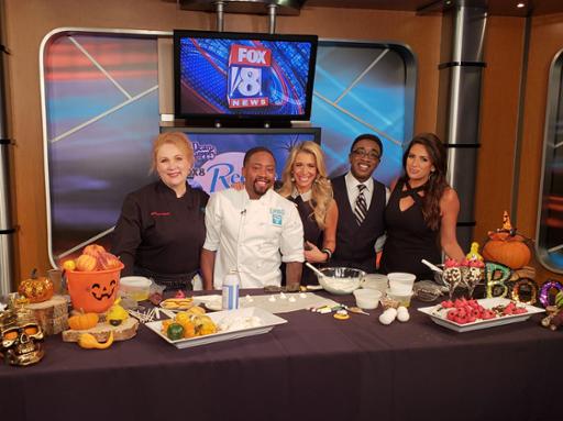 Tri-C culinary arts professor Maureen Leonard; Tri-C culinary student Shayvelle Conner; and Fox 8 Morning Show hosts Stefani Schaefer, Wayne Dawson and Kristi Capel gather for a group photo during the taping of a Fox 8 Recipe Box segment.