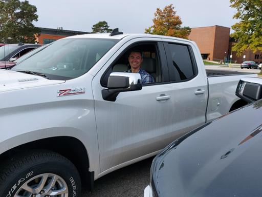 Tri-C student Eric Bost in a truck donated to the GM ASEP program at Tri-C.
