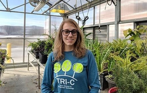 Lauren Linden in the Tri-C greenhouse