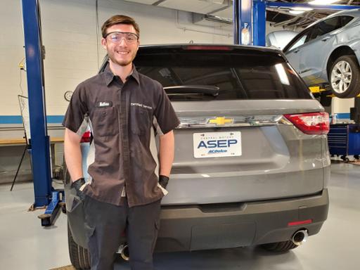 Tri-C student Matt Loy with a donated 2018 Chevy Traverse