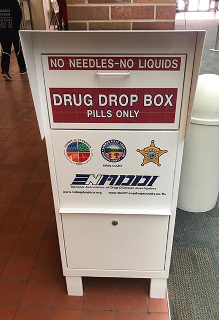 White prescription disposal box located at Tri-C Western Campus