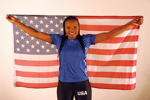 Tri-C grad and Olympic hopeful Morelle McCane holding an American flag