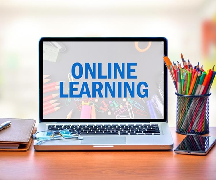 Laptop with "online learning" on screen