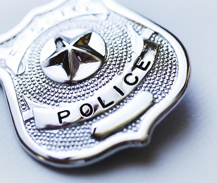 Close-up of police badge