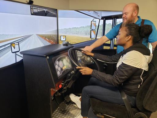 A future RTA bus operator training on a driving simulator at Tri-C's TRansportation Innovation Center in Euclid.