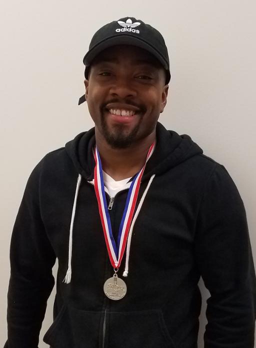 Shayvell Connor with silver medal