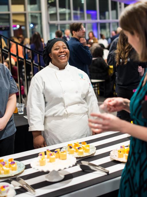 Tri-C culinary student at Small Bites, Big Dreams scholarship fundraiser