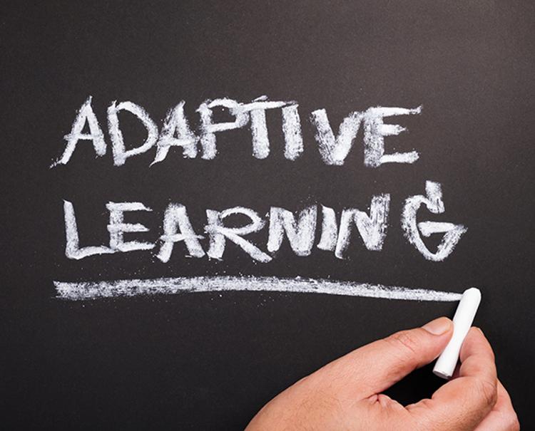 Adaptive learning written on chalkboard