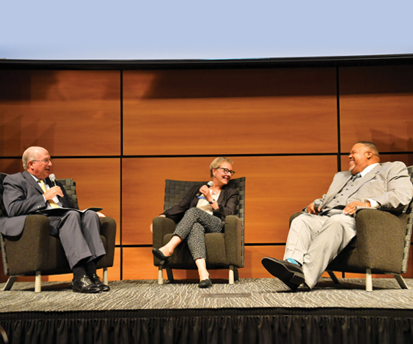 Photo with Bill Koehler (left), Laura Bloomberg (center), and Michael Baston (right)