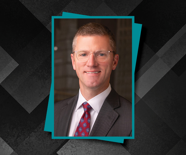 Graphic with image of Marty McGann