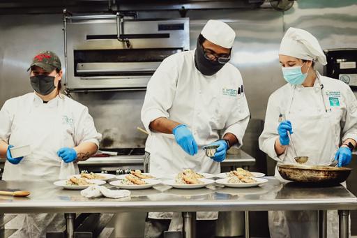 Tri-C culinary students preparing meals