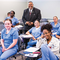 Dr. Baston with Students