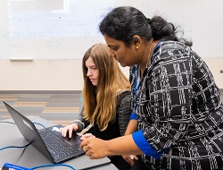 Student being instructed by faculty 